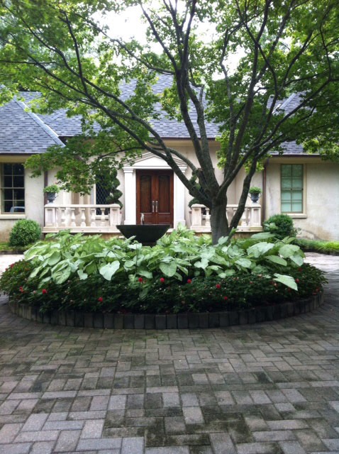 foliage bed with water fountain feature